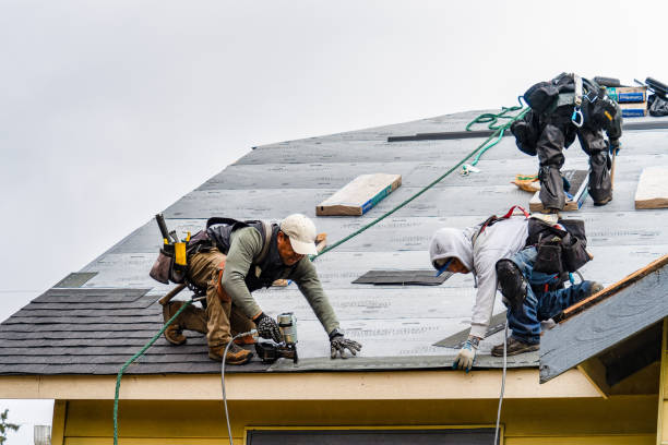 Professional Gutter Installation technician working in Oakland Mills, PA